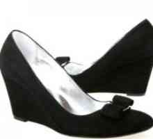 Črni čevlji klini