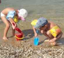 Otroci na plaži